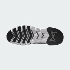 View of the outsole of the Nike Free Metcon 5 Men's grey training shoes, showing the multi-directional traction pattern for versatile gym performance.