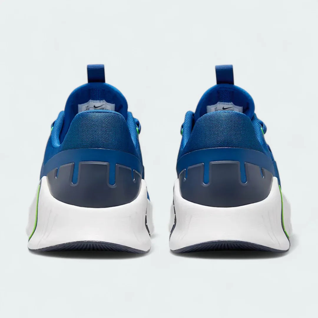 Rear view of the Nike Free Metcon 5 Men's blue training shoes, focusing on the wide, flat heel for lifting stability and subtle branding.