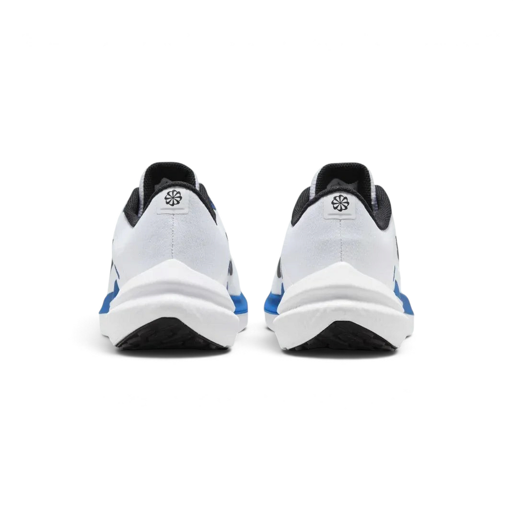 Rear view of the white trainers focusing on the structured heel support and the Star Blue detailing along the collar.