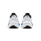 Rear view of the white trainers focusing on the structured heel support and the Star Blue detailing along the collar.