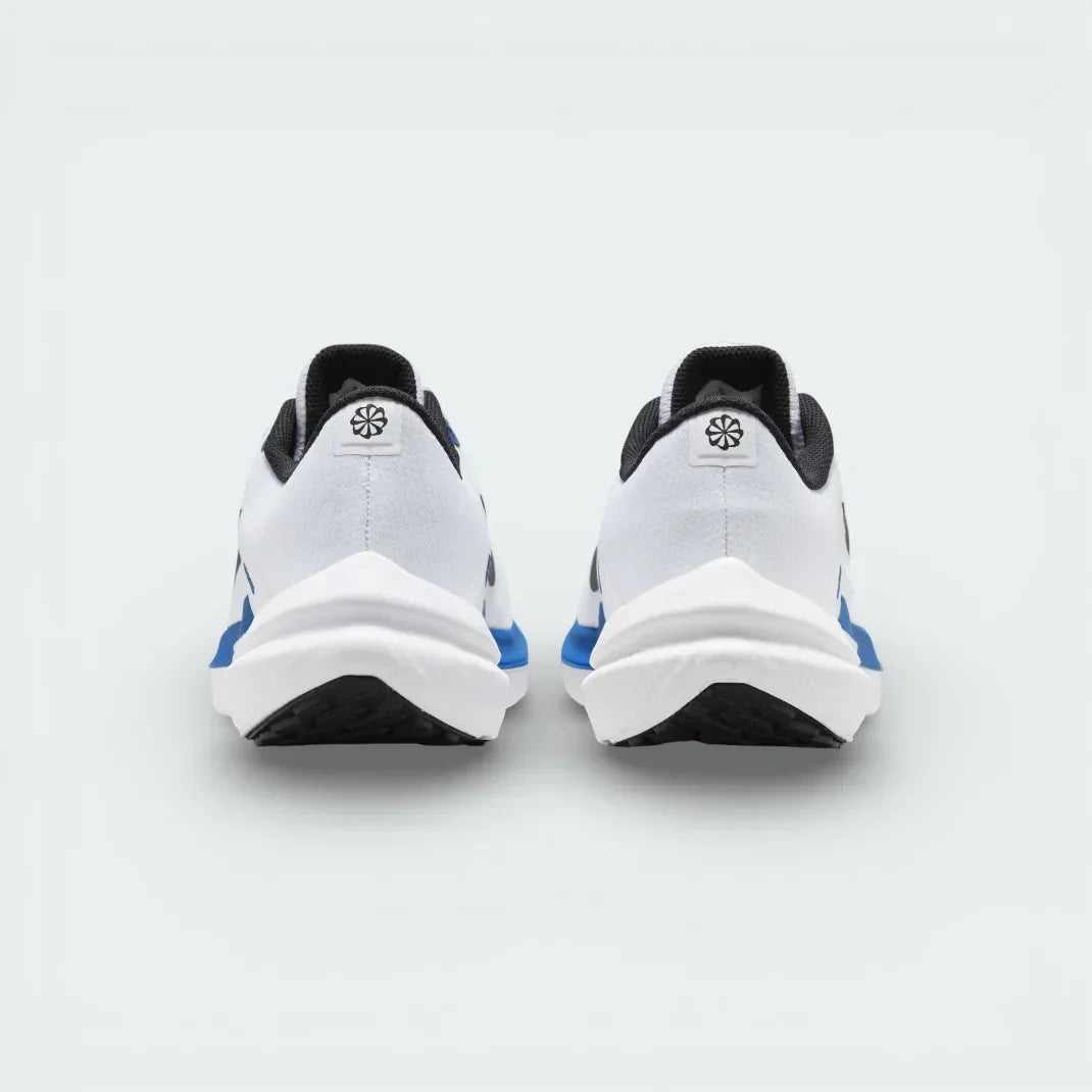Rear view of the white trainers focusing on the structured heel support and the Star Blue detailing along the collar.