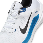 Close-up of the front of the Nike Winflo 10, showing the detail of the white engineered mesh and the sturdy laces for midfoot lockdown.