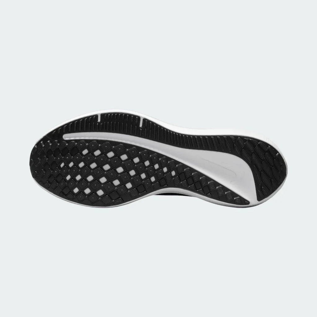 View of the outsole of the Nike Air Winflo 10 Men's navy running shoes, showing the durable rubber tread pattern for road traction.