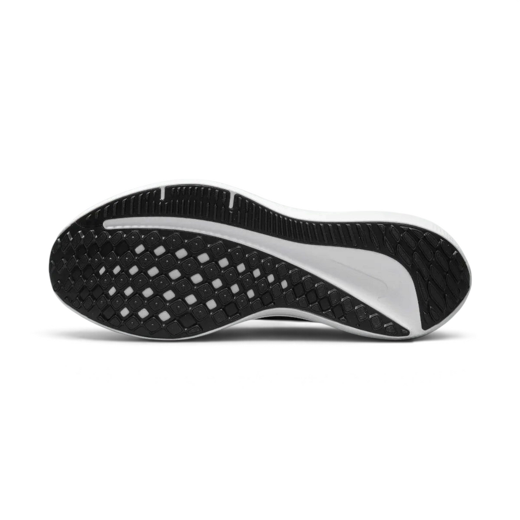 View of the outsole of the Nike Air Winflo 10 Men's navy running shoes, showing the durable rubber tread pattern for road traction.