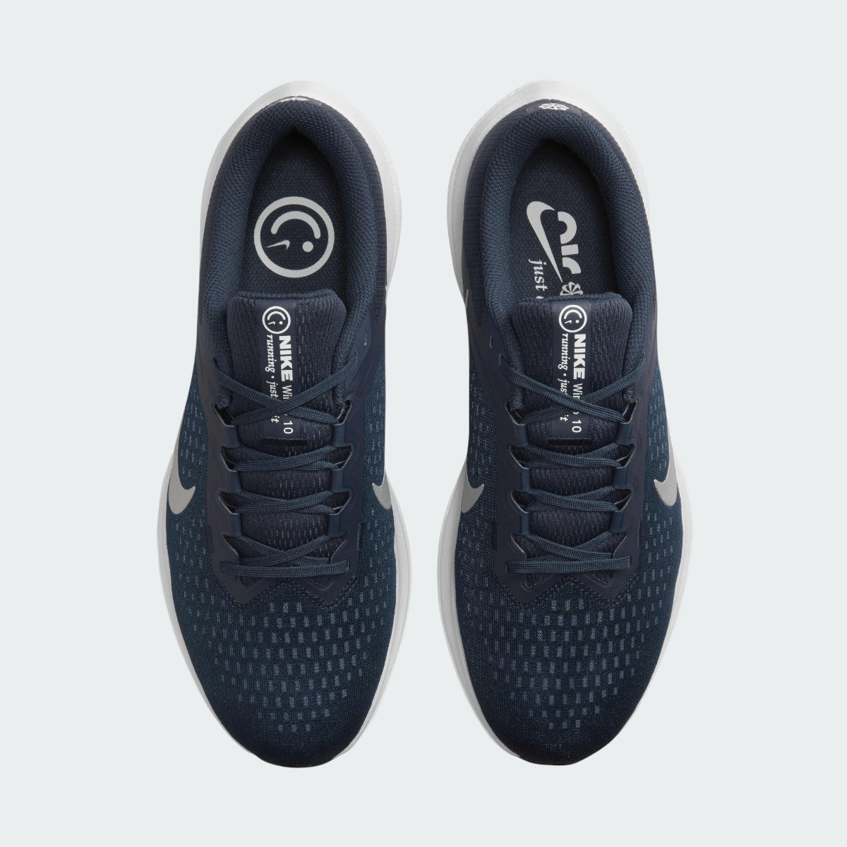 Top-down view of a pair of Nike Air Winflo 10 Men's running shoes in navy, highlighting their streamlined silhouette and lace-up closure.