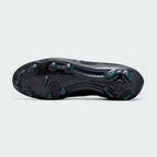 View of the outsole of the Nike Legend 10 Elite FG men's boots, showing the mix of conical and bladed studs for firm ground traction.