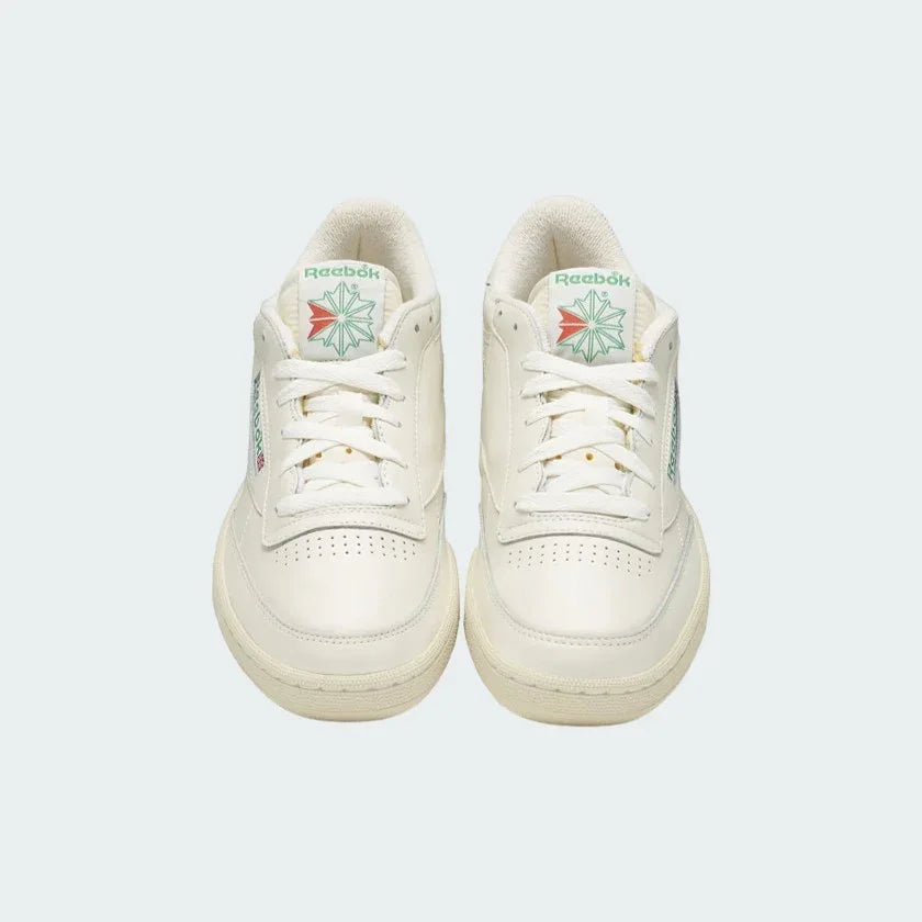 Top-down view of a pair of Reebok Classic Club C 85 Vintage trainers in chalk leather, highlighting the classic design and lace-up closure.