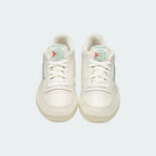 Top-down view of a pair of Reebok Classic Club C 85 Vintage trainers in chalk leather, highlighting the classic design and lace-up closure.