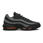 Nike Air Max 95 Men's running shoes in black, side profile showing visible Max Air units in the heel and forefoot, and a layered upper.