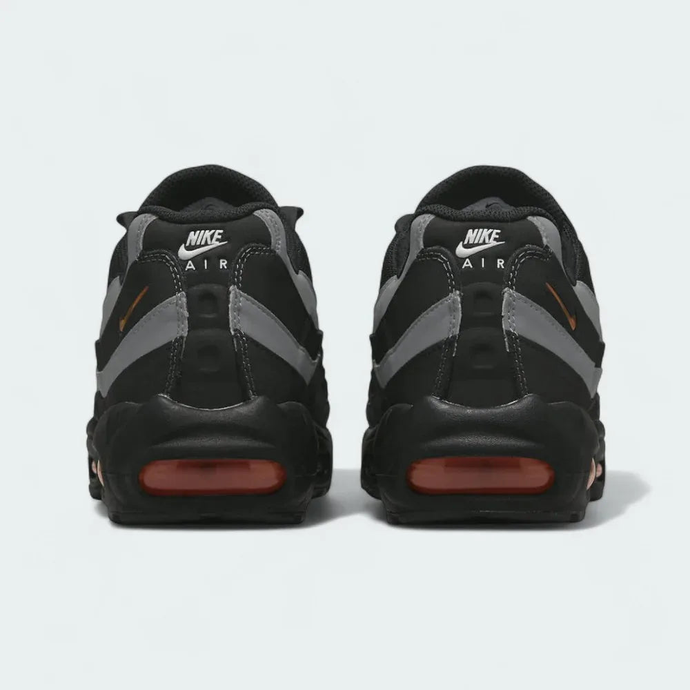 Rear view of the Nike Air Max 95 Men's running shoes, focusing on the prominent heel counter and Nike Air branding.
