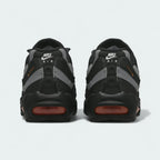 Rear view of the Nike Air Max 95 Men's running shoes, focusing on the prominent heel counter and Nike Air branding.
