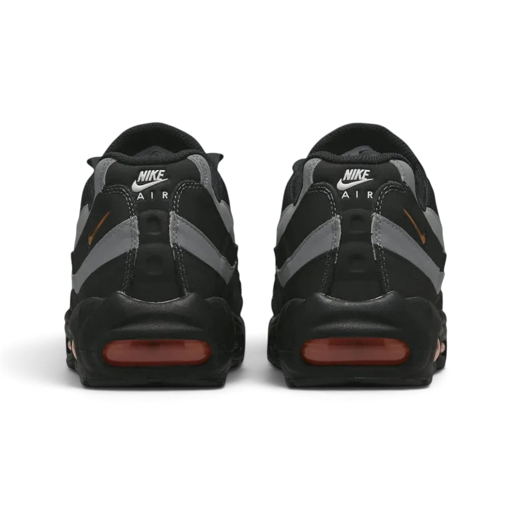 Rear view of the Nike Air Max 95 Men's running shoes, focusing on the prominent heel counter and Nike Air branding.