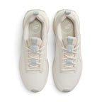 Highlighting the symmetrical central lacing throat, flat tonal laces, padded tongue with Nike Air Max branding, and cushioned sockliner, demonstrating the upper template constructed for a comfortable "locked-in" fit.