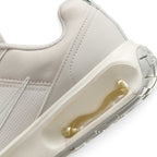 Highlighting the Visible Heel Nike Air Unit Window, Sculpted Sail Foam Midsole Carrier, and Rubber Waffle Tread, demonstrating the impact-absorbing air depth and street-tested tooling.