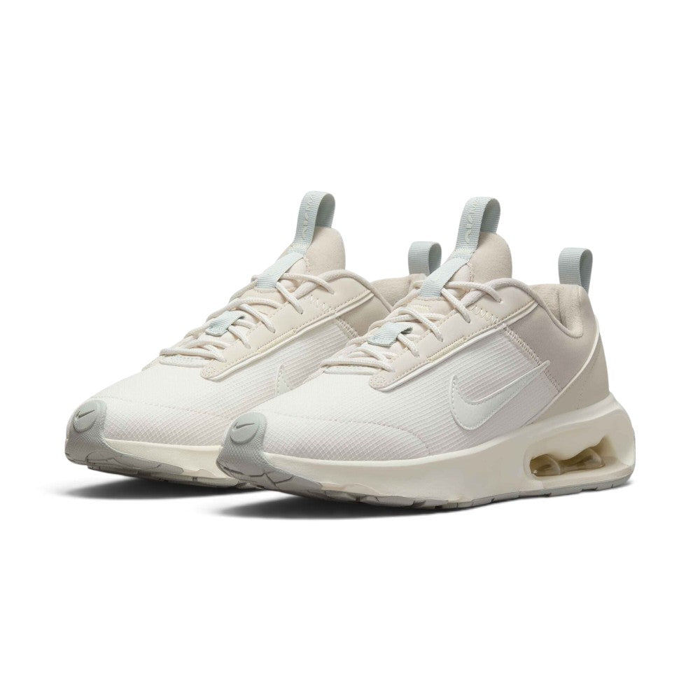 Showcasing the "unreal" clean lines, layered neutral phantom-to-orewood tones, and sculpted foam sidewalls from a 45-degree perspective.