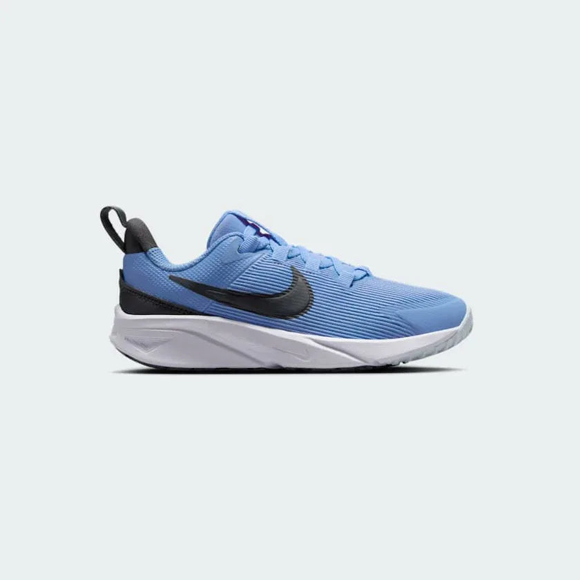Nike Star Runner 4 Next Nature Children's trainers side profile in blue Main image