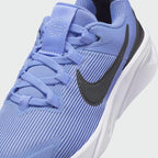 Close-up of Nike Star Runner 4 Next Nature Children's trainers showing breathable mesh and logo detail