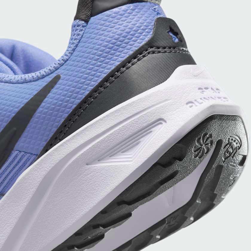 Close-up from heel underside showing durable outsole and recycled materials of Nike Star Runner 4 Next Nature Children's trainers
