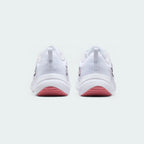 Rear view of the Nike Downshifter 12 Premium Women's white training shoes, focusing on the structured heel and subtle branding.
