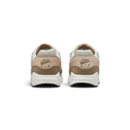 Rear view of the Nike Air Max 1 Juniors' trainers, focusing on the prominent heel counter and Nike Air branding.