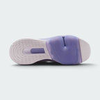 Displays the full-length purple and lilac rubber sole, showcasing the horseshoe-shaped flex groove around the Zoom Air forefoot pod and the concentric ring stability tread on the heel.