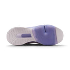 Displays the full-length purple and lilac rubber sole, showcasing the horseshoe-shaped flex groove around the Zoom Air forefoot pod and the concentric ring stability tread on the heel.