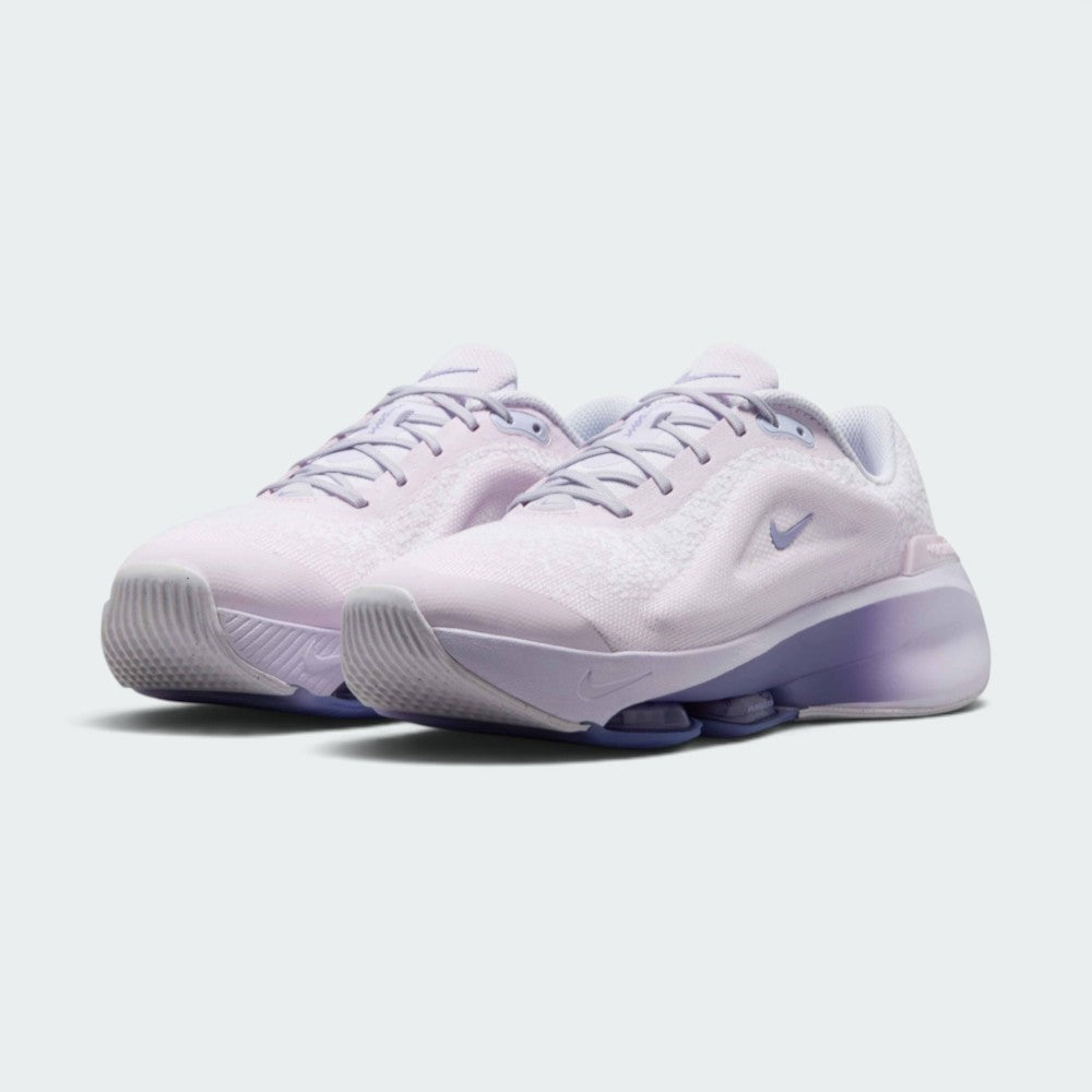 Emphasising the low-cut, rounded workout silhouette and the subtle color transition from light lilac uppers to dark amethyst midsole bases.