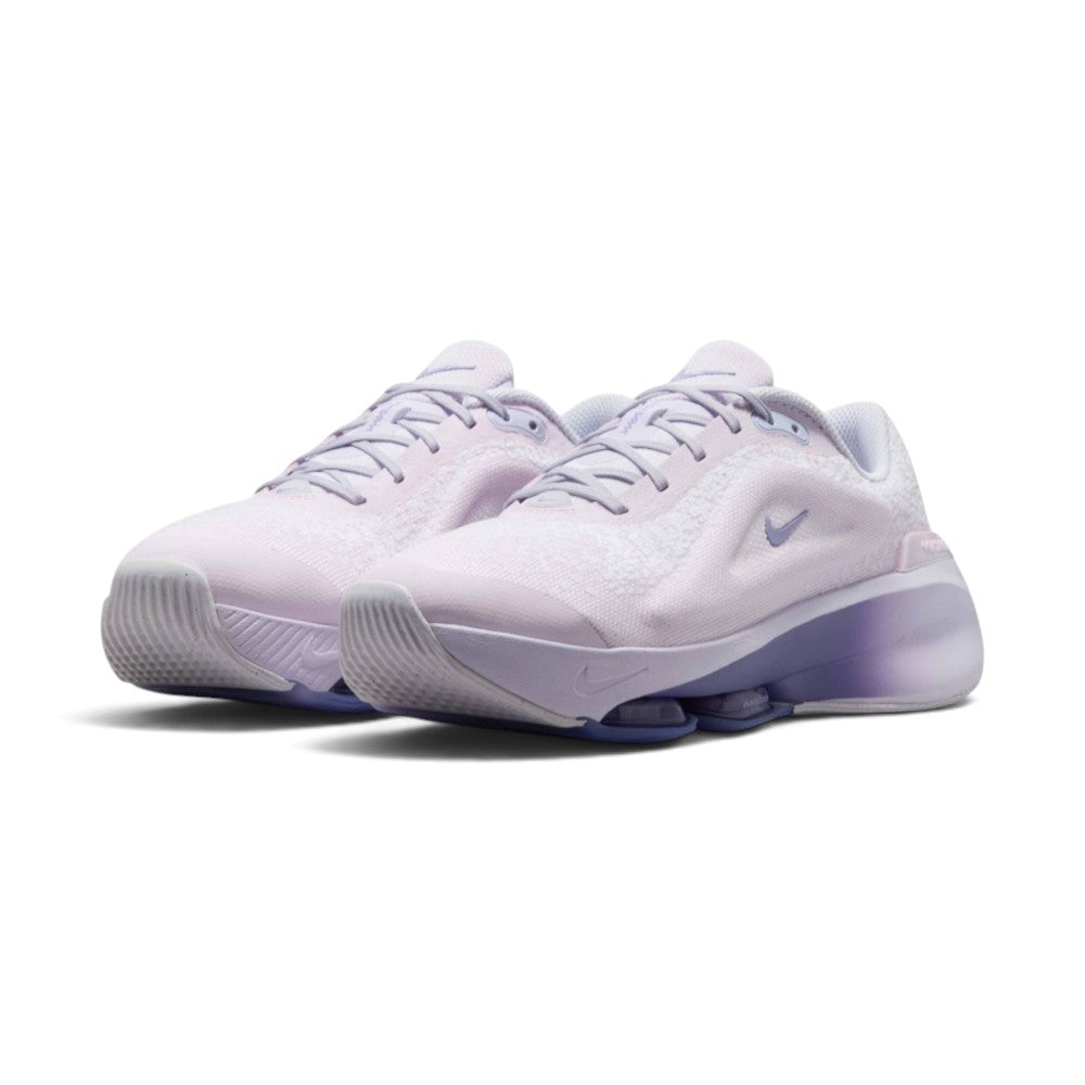 Emphasising the low-cut, rounded workout silhouette and the subtle color transition from light lilac uppers to dark amethyst midsole bases.