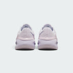 Focuses on the rear profile, highlighting the textured chenille heel counter, moulded pink-lilac heel stability band stamped with "versair" text, and the wide flared base of the foam midsole.