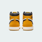 Rear view of the Air Jordan 1 Retro High OG Men's yellow trainers, focusing on the Wings logo on the ankle collar and contrasting heel panels.