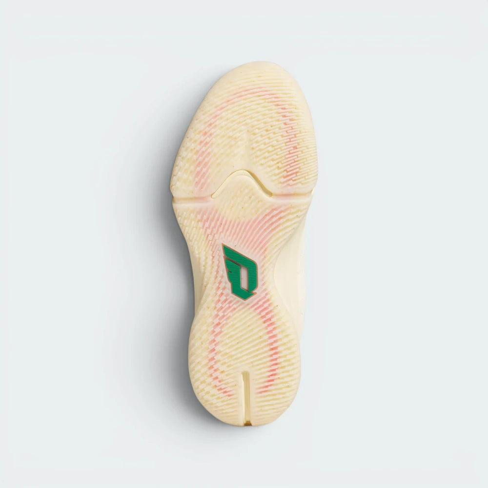 Displays the technical rubber tread geometry designed for unreal multidirectional squeak and court grip.