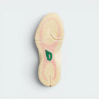 Displays the technical rubber tread geometry designed for unreal multidirectional squeak and court grip.