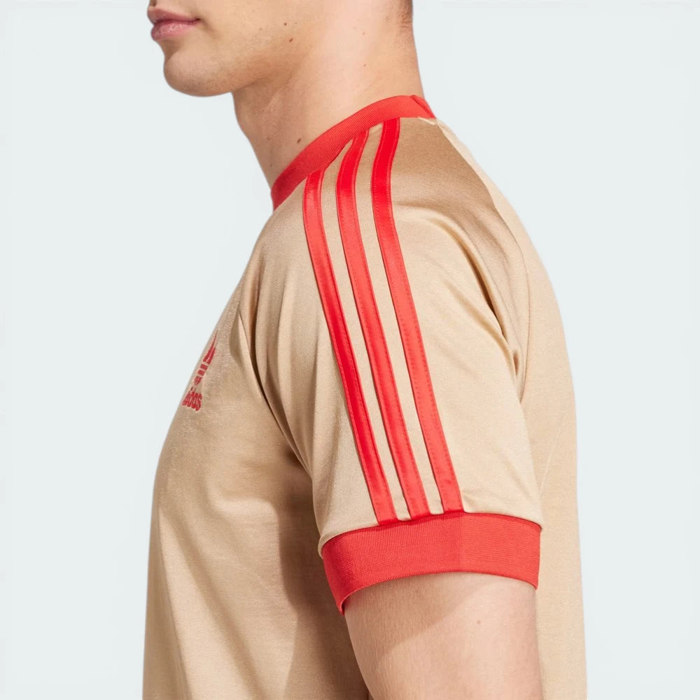 Side profile of the Magic Beige David Beckham tee, highlighting the slim, contoured fit and the clean sleeve finish.