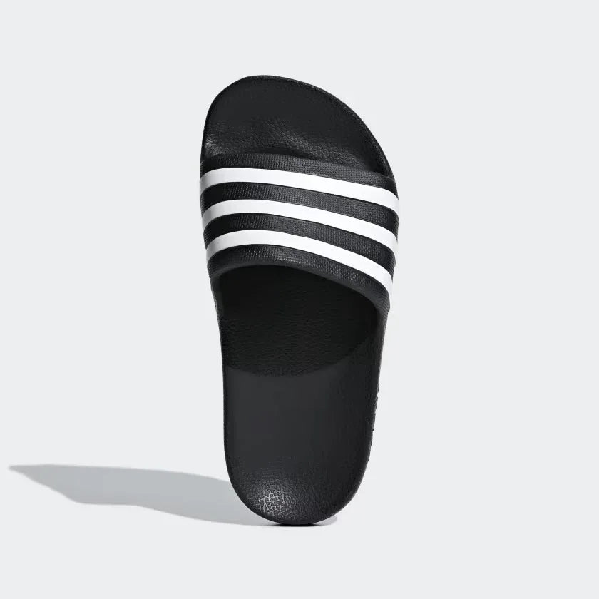 Highlighting the slip-on construction and Cloudfoam footbed and the smooth moulded texture for a "locked-in" archival look. Main image