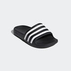 Showcasing the "unreal" lightweight drape and the high-contrast Black/White saturation from a 45-degree angle.