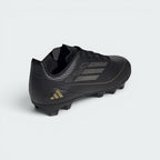 Focuses on the sleek heel construction and the professional finish of the synthetic leather.