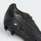 Highlights the "unreal" finish of the multi-surface rubber studs and the stable base.