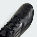 Details the high-definition textured grain and the precision of the junior-sized lacing.