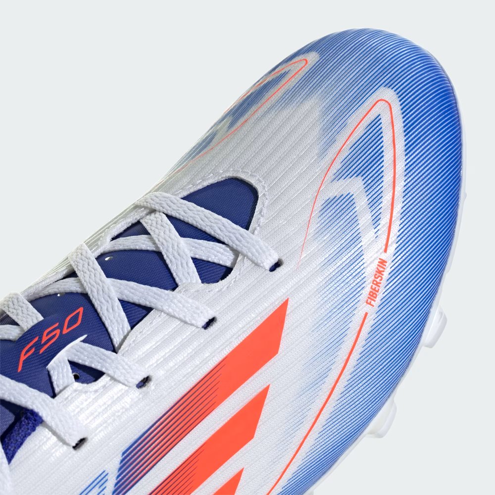 Zoom Looking at the Front of the Shoes and Laces: A close-up of the Fiberskin texture and the precision-stitched strike zone.