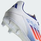 Zoom Looking at the Outsole and Midsole: Highlighting the FxG stud engineering and the high-quality Adidas branding.