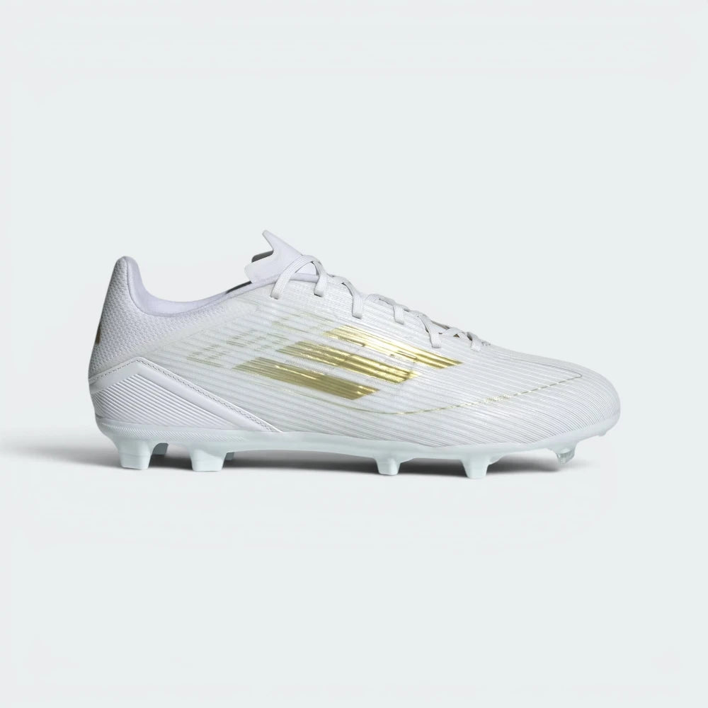 Highlights the high-velocity Gold Metallic 3-Stripes slashing across the professional depth of the Cloud White Fiberskin upper.