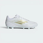 Highlights the high-velocity Gold Metallic 3-Stripes slashing across the professional depth of the Cloud White Fiberskin upper.