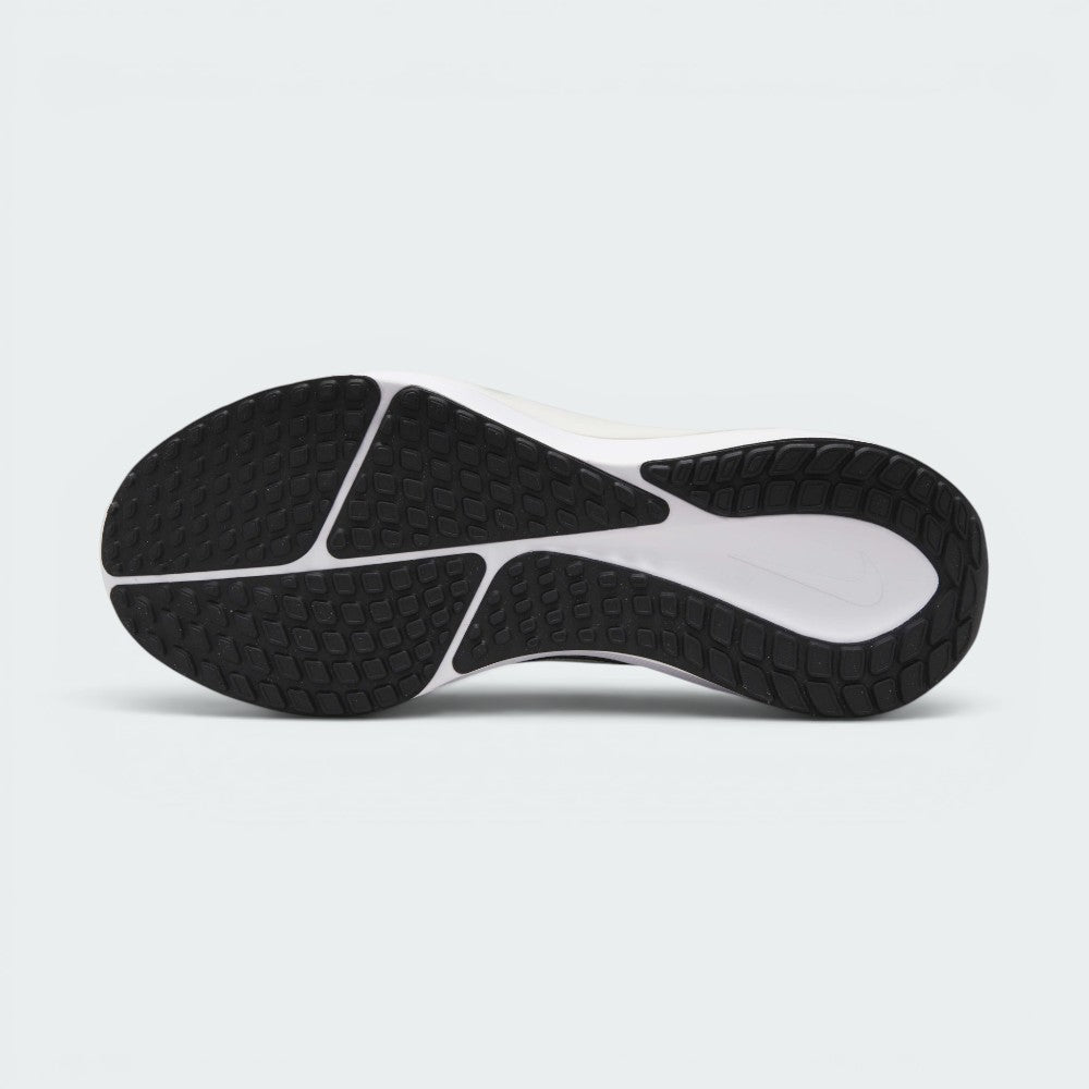 Displays the revamped technical traction pattern across the rubber sole, highlighting the strategically positioned high-friction lugs engineered for unreal everyday multi-surface road grip and a smooth, fluid roll-through.