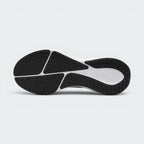 Displays the revamped technical traction pattern across the rubber sole, highlighting the strategically positioned high-friction lugs engineered for unreal everyday multi-surface road grip and a smooth, fluid roll-through.
