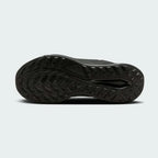 View of the outsole of the Nike Juniper Trail 2 Gore-Tex Women's black trainers, showing deep, multi-directional rubber lugs for trail traction.