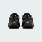 Rear view of the Nike Juniper Trail 2 Gore-Tex Women's black trainers, focusing on the structured heel and subtle branding.