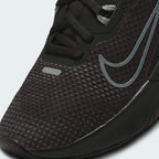 Close-up zoom on the front of the Nike Juniper Trail 2 Gore-Tex Women's black trainers, showing the reinforced toe cap, waterproof upper texture, and lacing system.