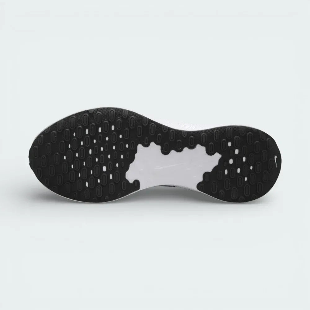 View of the rubber outsole of the Nike FB2207 007, showcasing the data-driven traction pattern and flex grooves for natural foot movement.