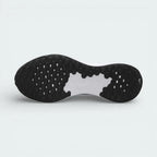 View of the rubber outsole of the Nike FB2207 007, showcasing the data-driven traction pattern and flex grooves for natural foot movement.