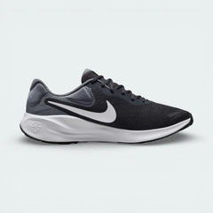 Black and gray running shoe with white Nike logo on a light gray background